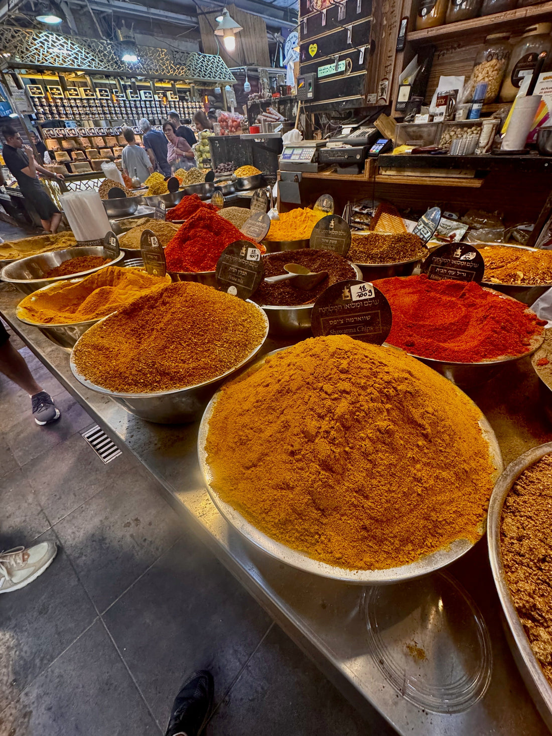 bowls of fresh spices in a giant spice market in Israel